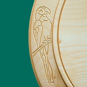 Closeup Parrot engraving French ski chalet cheese board